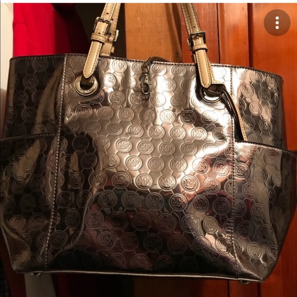 Michael Kors Handbags - Michael Kors Gold Tote with Signature Logo across back and front